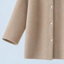 Veste à col rond Savrille — détail de la manche