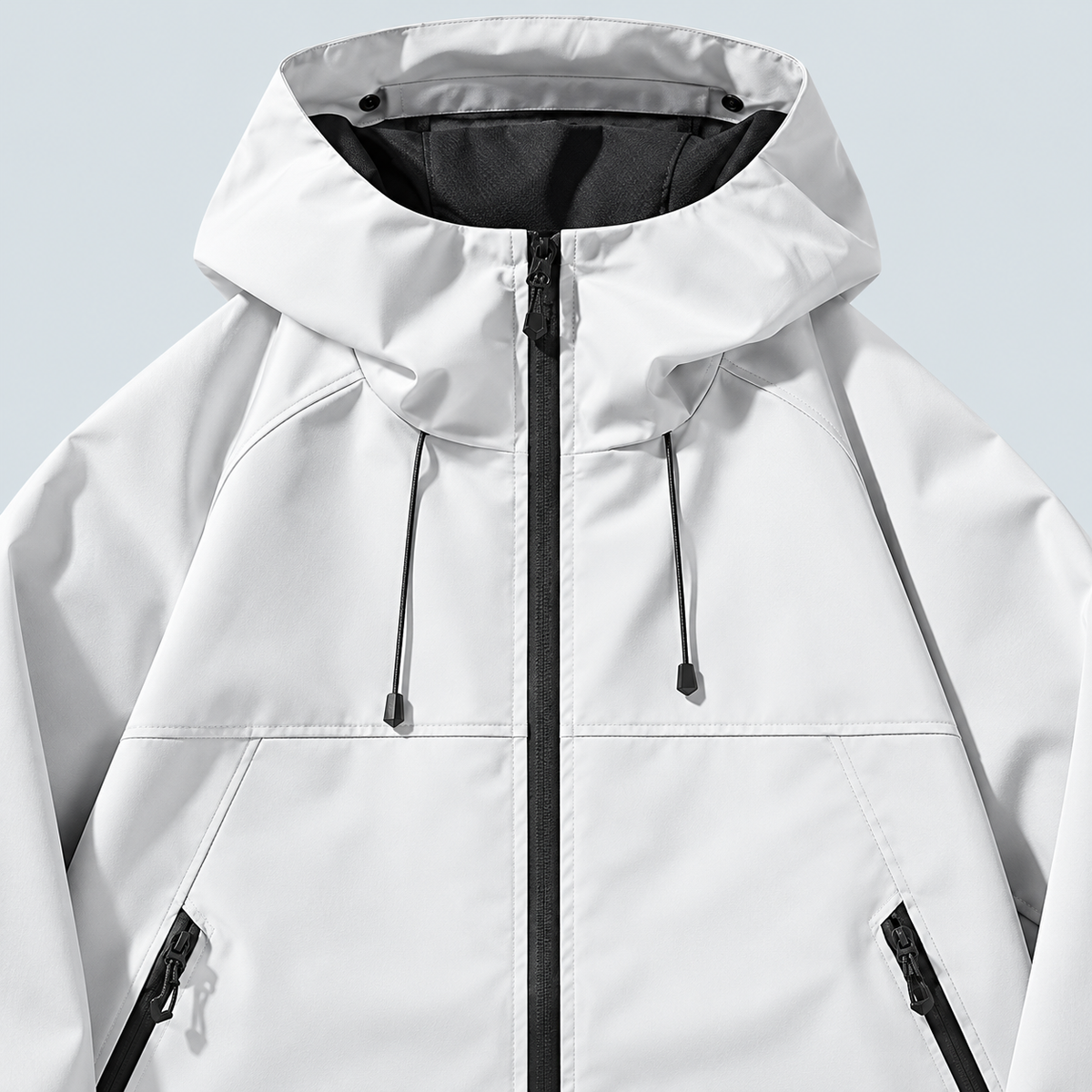 Veste unisexe à capuche et poches zippées — Détail capuche et fermeture